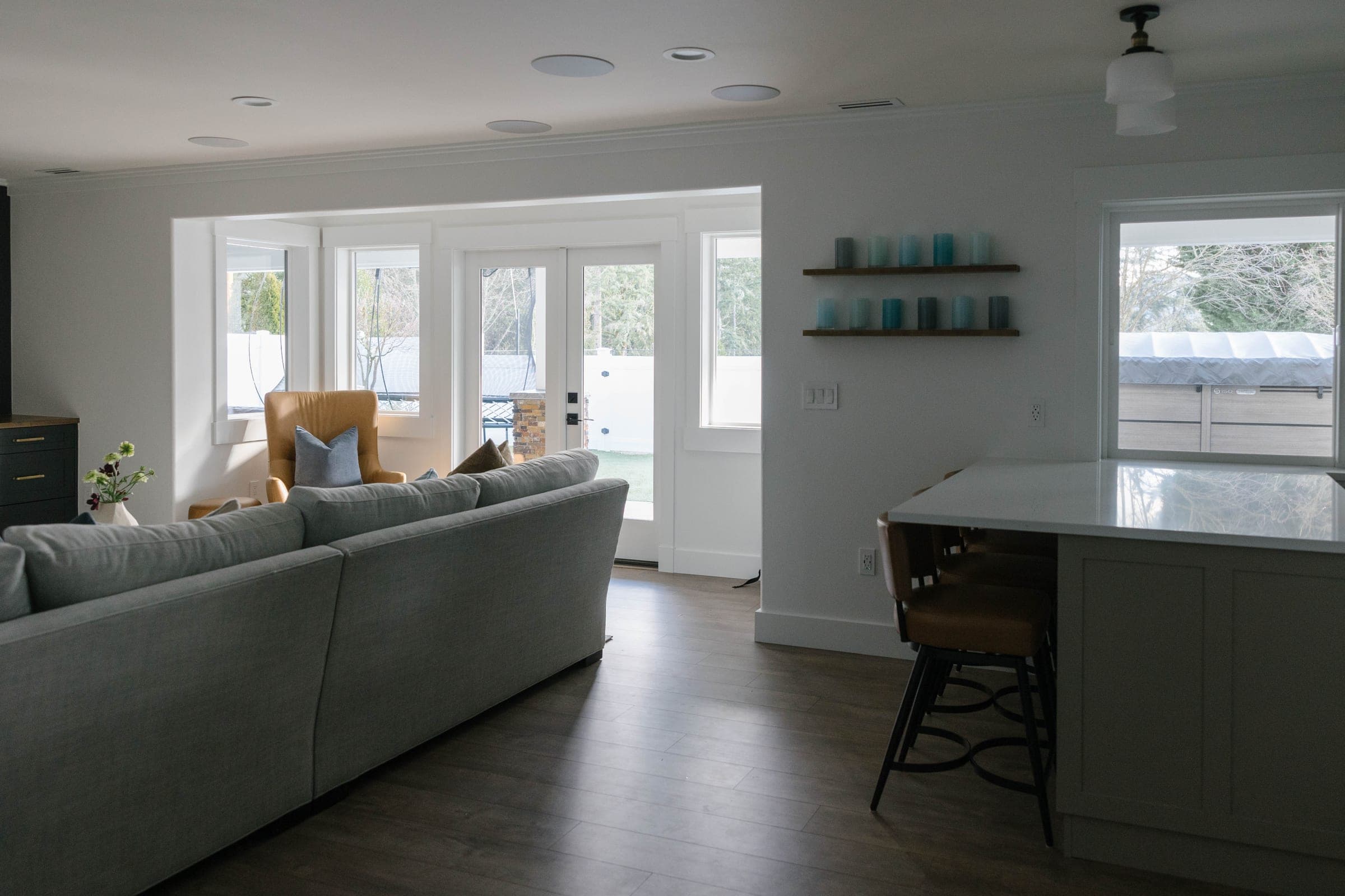 Highlands Basement living area with garden doors and the small kitchen beyond, Issaquah