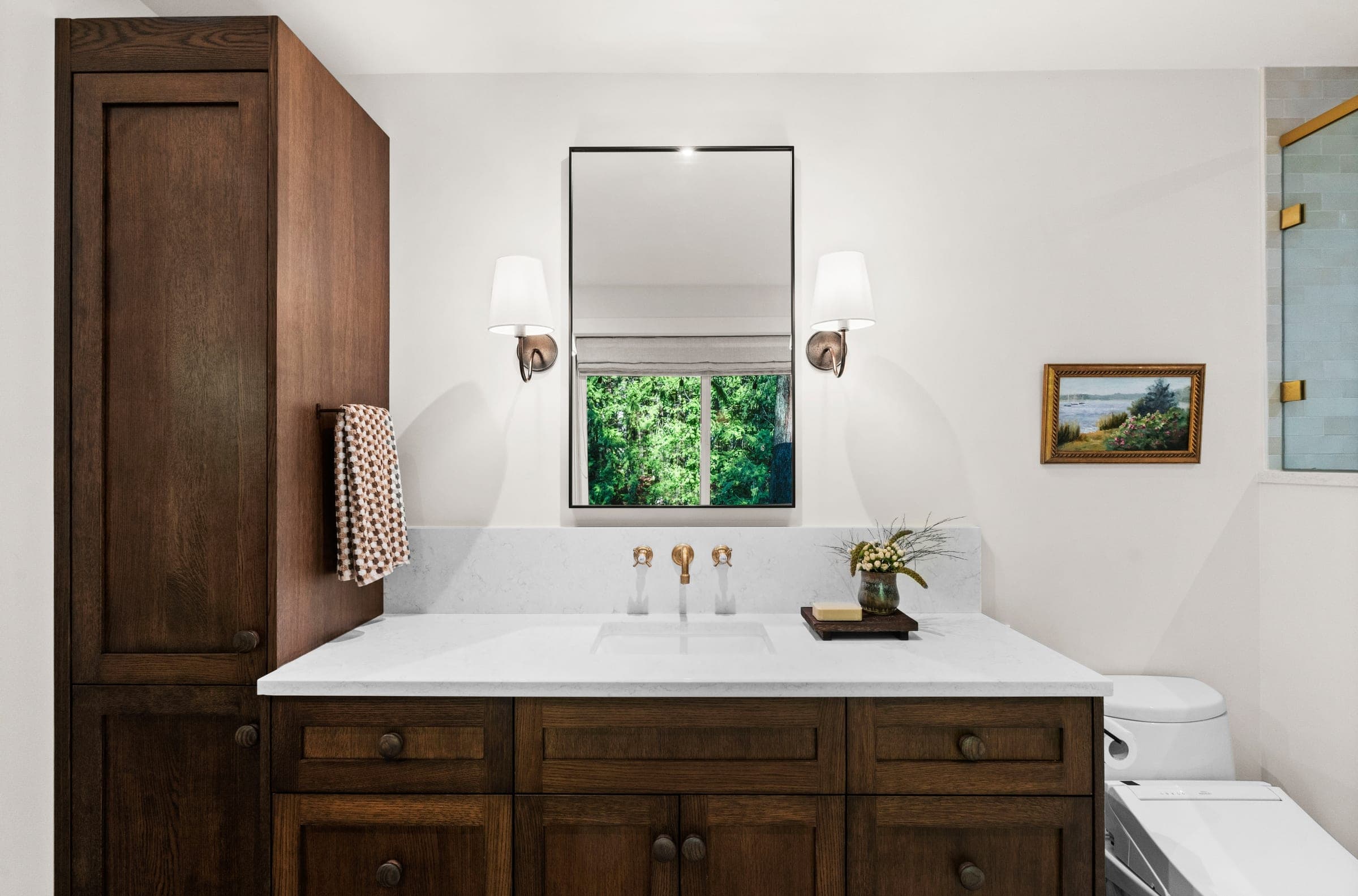 Custom rift-sawn white oak vanity and tall cabinet in the River Front Master Suite ensuite